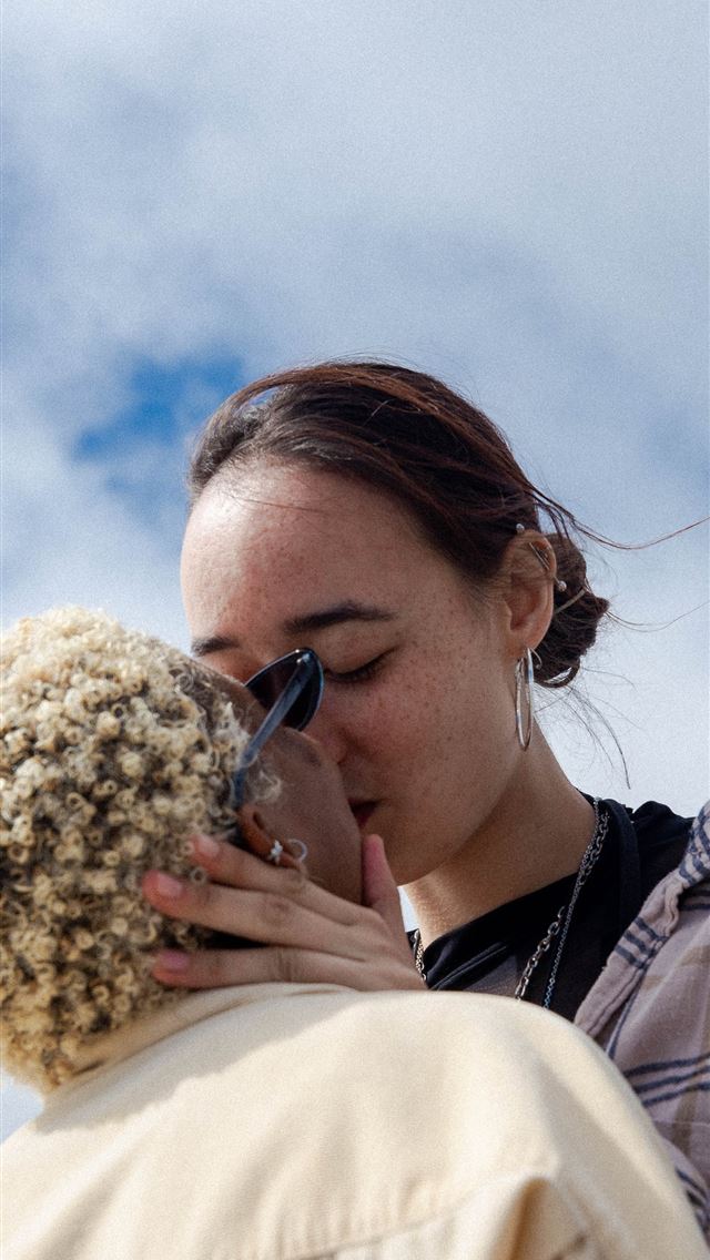 1290x2796 woman in white and woman in plaid shirt kissing -  iphone 14 Wallpaper
