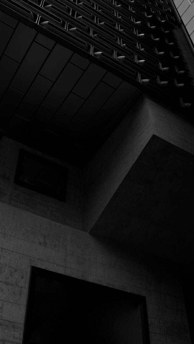 1290x2796 view of a gray building - window iPhone Wallpaper