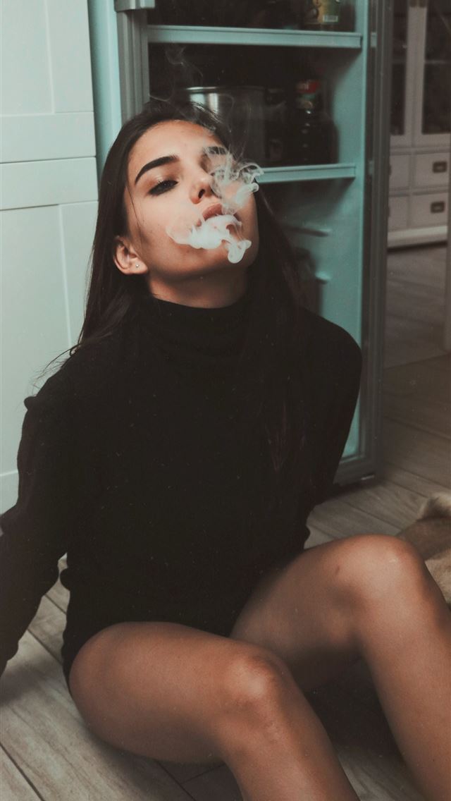 1290x2796 woman sitting on floor while smoking -  iphone 14 Wallpaper