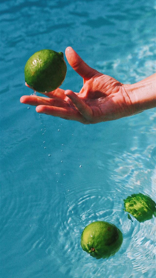 1290x2796 person holding green round fruit - colorful iPhone Wallpaper