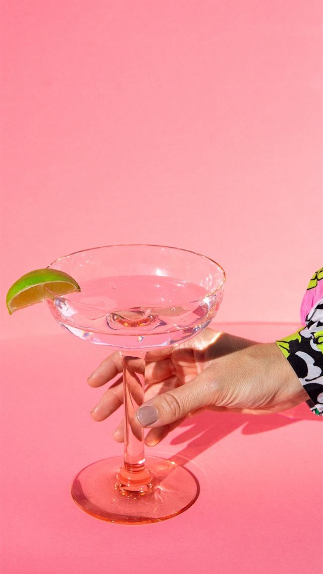 1290x2796 person holding clear wine glass with pink liquid - colorful iPhone Wallpaper