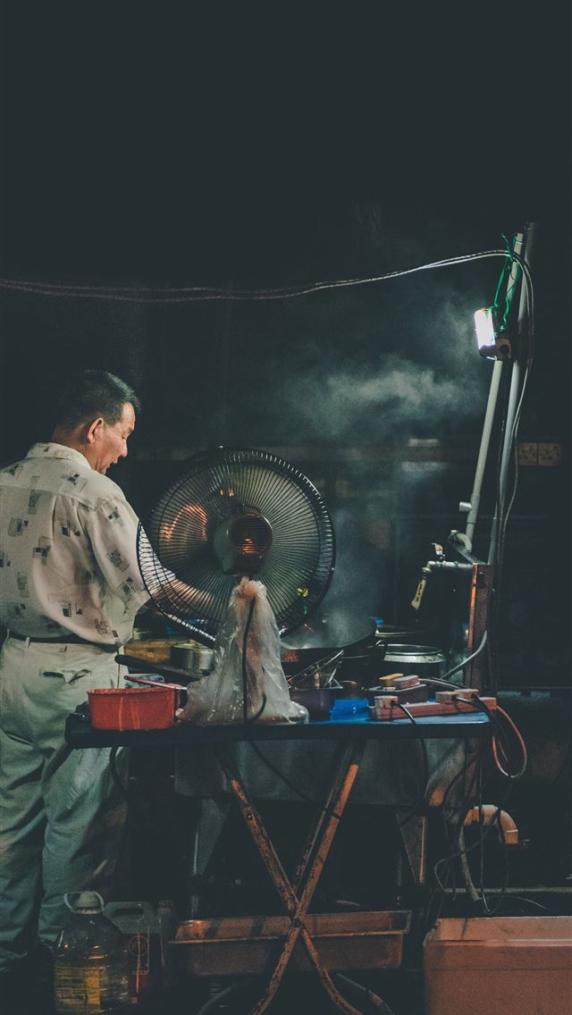 1290x2796 person using grill - smoke iPhone Wallpaper