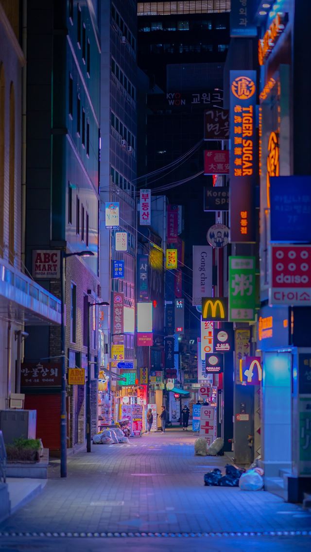 1290x2796 people walking on sidewalk near buildings during n... - city iPhone Wallpaper