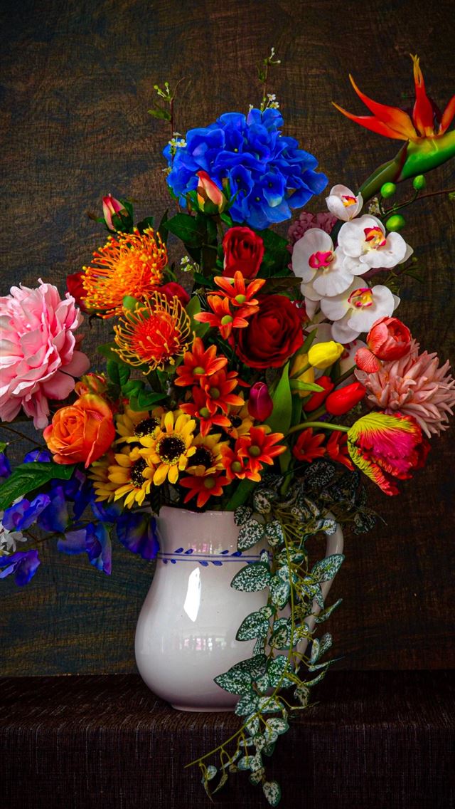 1290x2796 assorted flowers in white vase on brown surface - art iPhone Wallpaper
