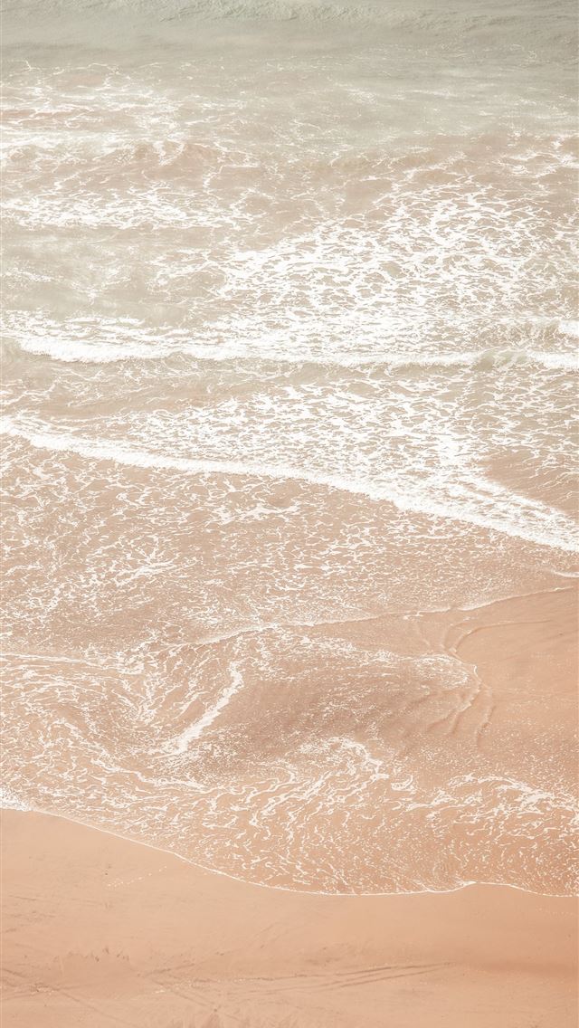 1290x2796 brown sand near body of water during daytime - beach iPhone Wallpaper