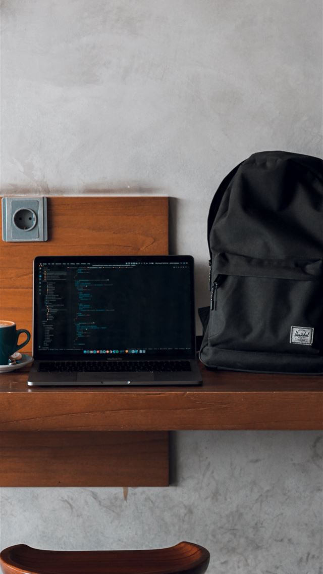 1290x2796 laptop computer beside backpack and coffee mug - coffee iPhone Wallpaper