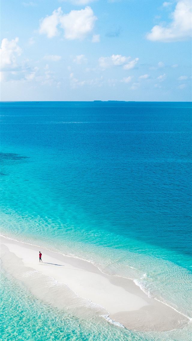 1290x2796 blue sea under blue sky during daytime - beach iPhone Wallpaper