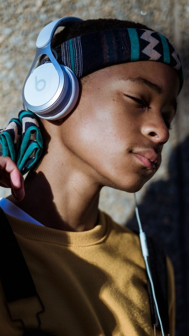 1290x2796 boy listening headphones - music iPhone Wallpaper