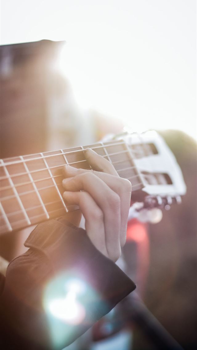 1290x2796 person playing guitar - music iPhone Wallpaper
