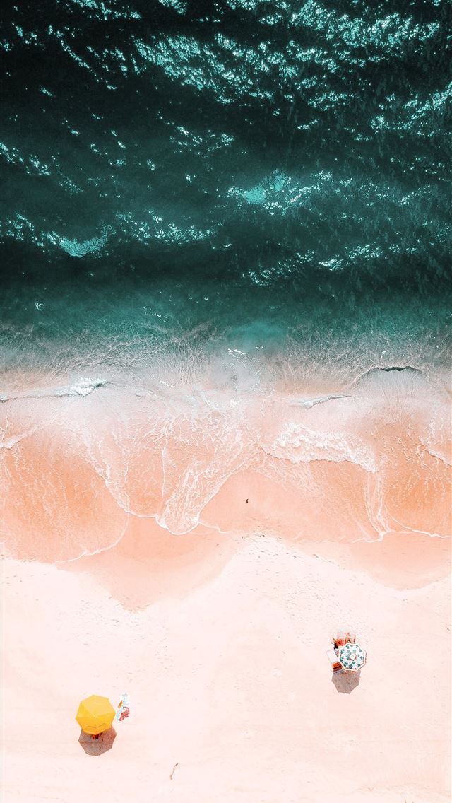 1290x2796 bird's eye view of two yellow and green umbrellas ... -  iphone 14 Wallpaper