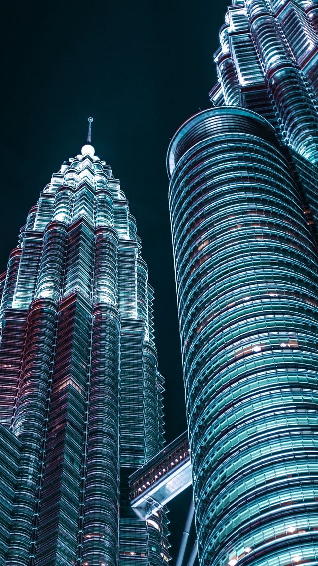 1290x2796 low angle photography of Petronas twin tower - city iPhone Wallpaper