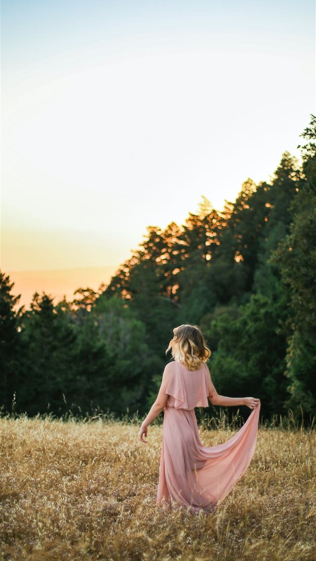 1290x2796 woman in pink dress standing on brown grass field ... - girls iPhone Wallpaper