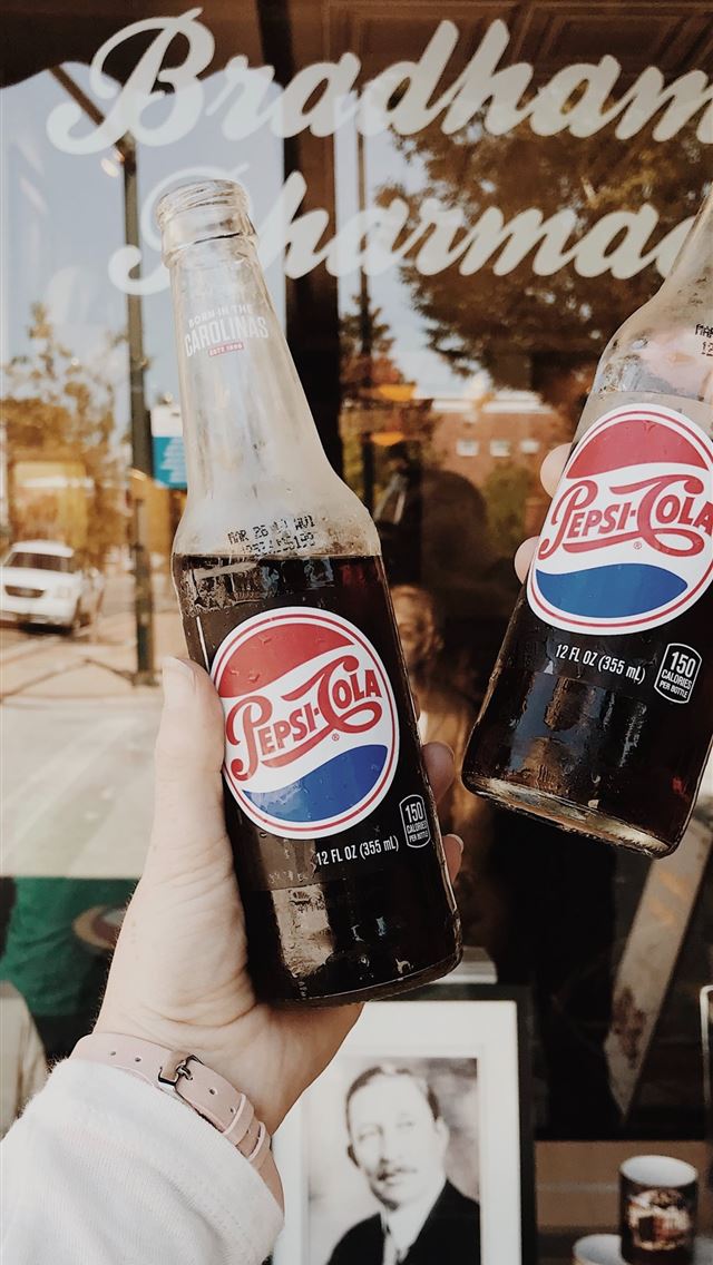 1290x2796 person holding Pepsi Cola soda bottles - vintage iPhone Wallpaper