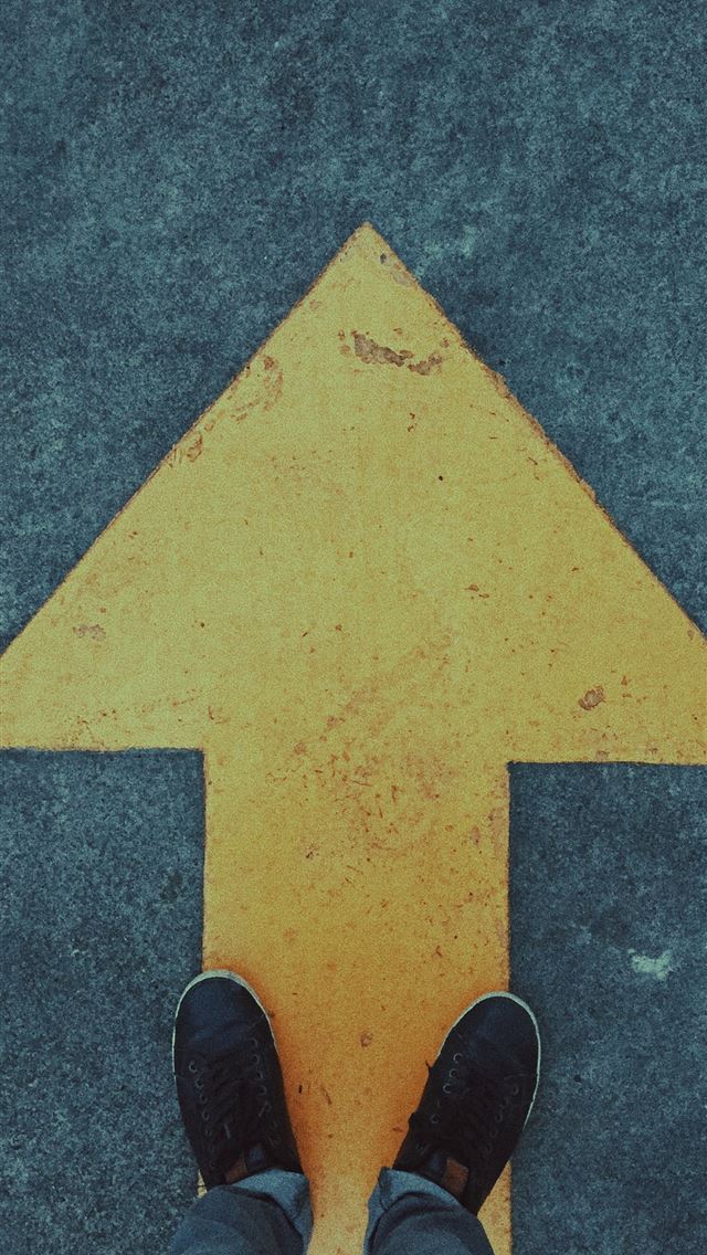 1290x2796 person standing on yellow arrow - yellow iPhone Wallpaper