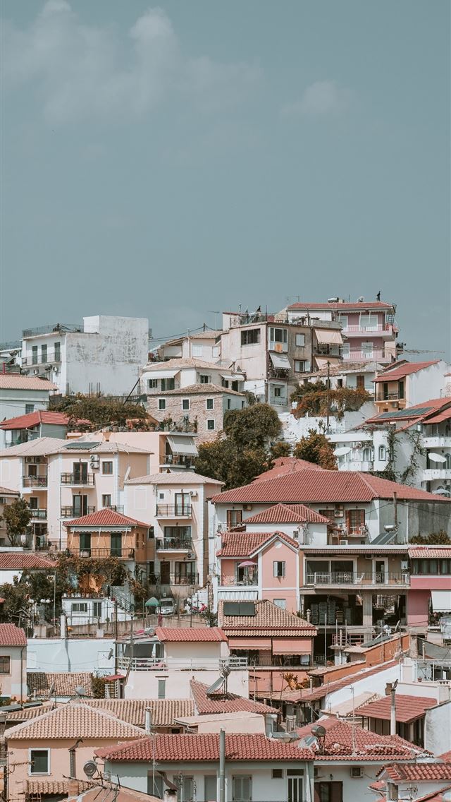 1290x2796 village under cloudy sky during daytime - landscape iPhone Wallpaper