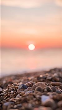 macro shot photography of brown pebbles wallpaper