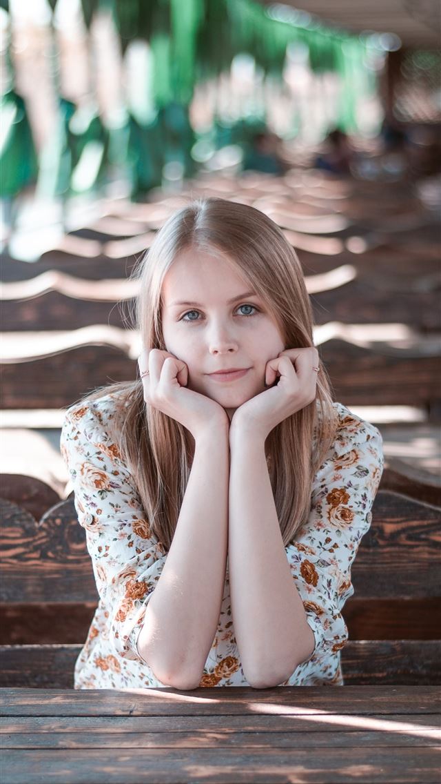 1290x2796 selective focus of woman resting hands on face whi... - girl iPhone Wallpaper