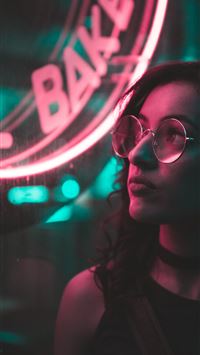 woman wearing eyeglasses with light effect photo wallpaper