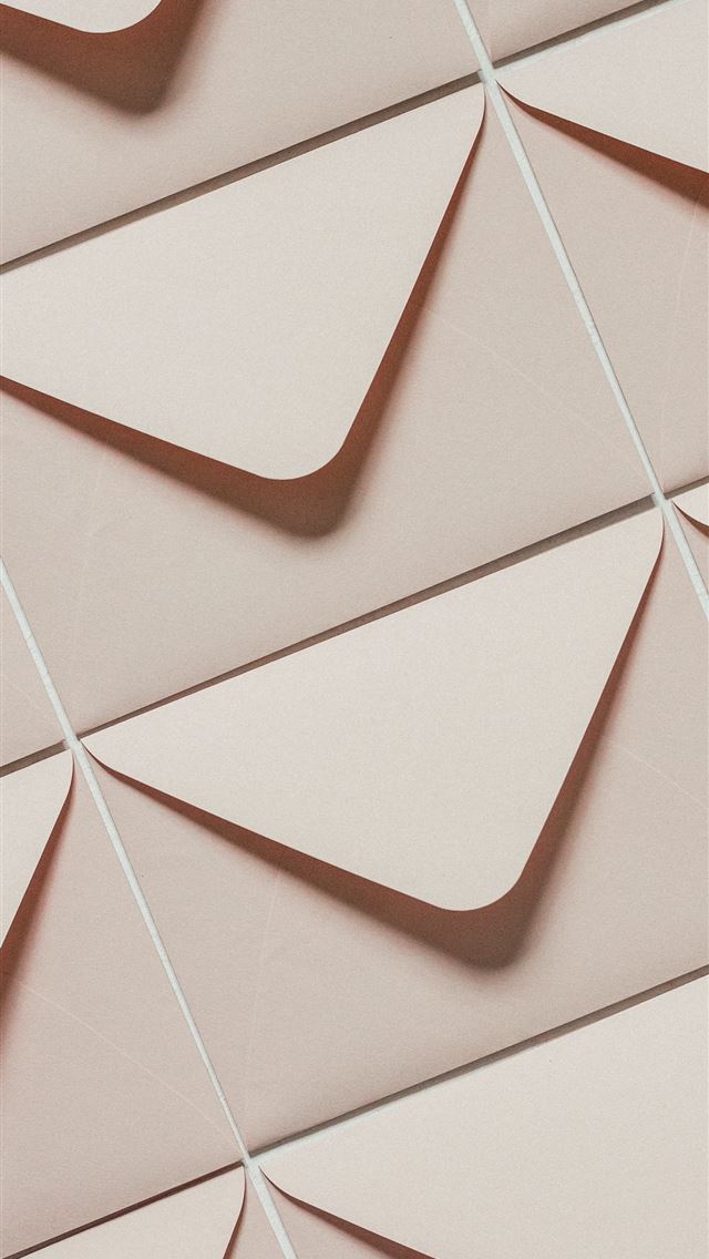 1290x2796 a close up of a wall made of paper - website iPhone Wallpaper