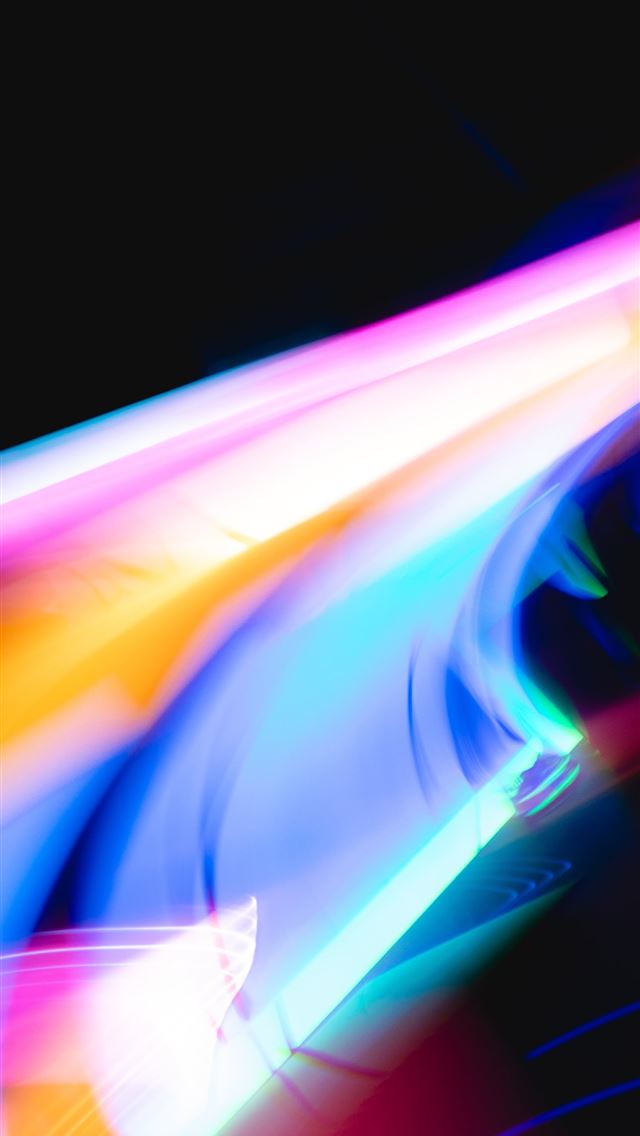 1290x2796 a blurry photo of a cell phone with a blurry backg... - neon iPhone Wallpaper