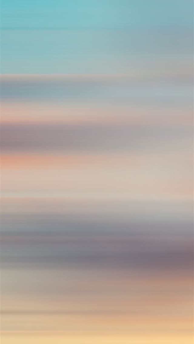 1290x2796 a blurry photo of a sunset over the ocean - yoga iPhone Wallpaper