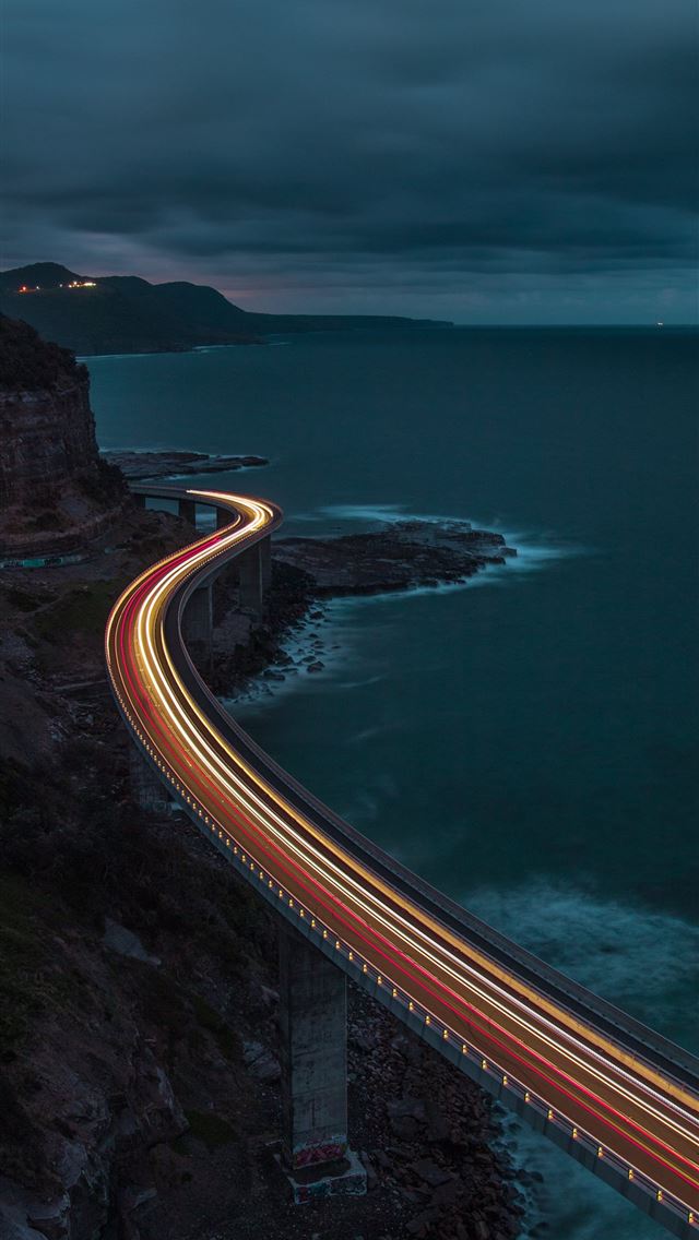 1290x2796 a long exposure photo of a highway going over the ... - scenery iPhone Wallpaper