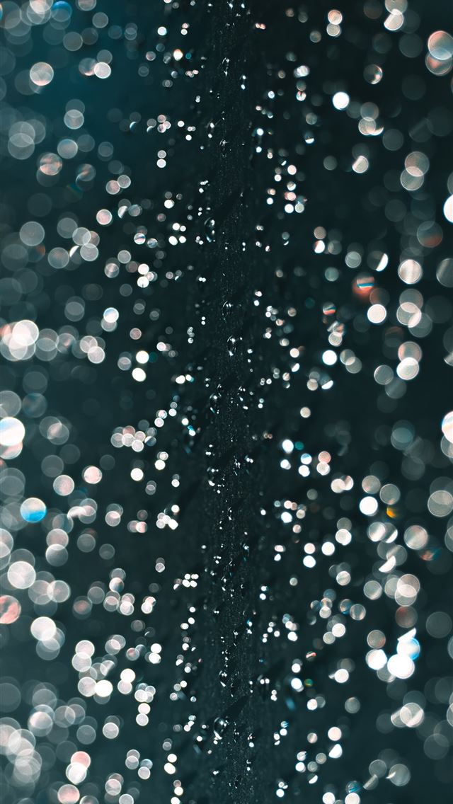 1290x2796 a close up of water droplets on a window - texture iPhone Wallpaper