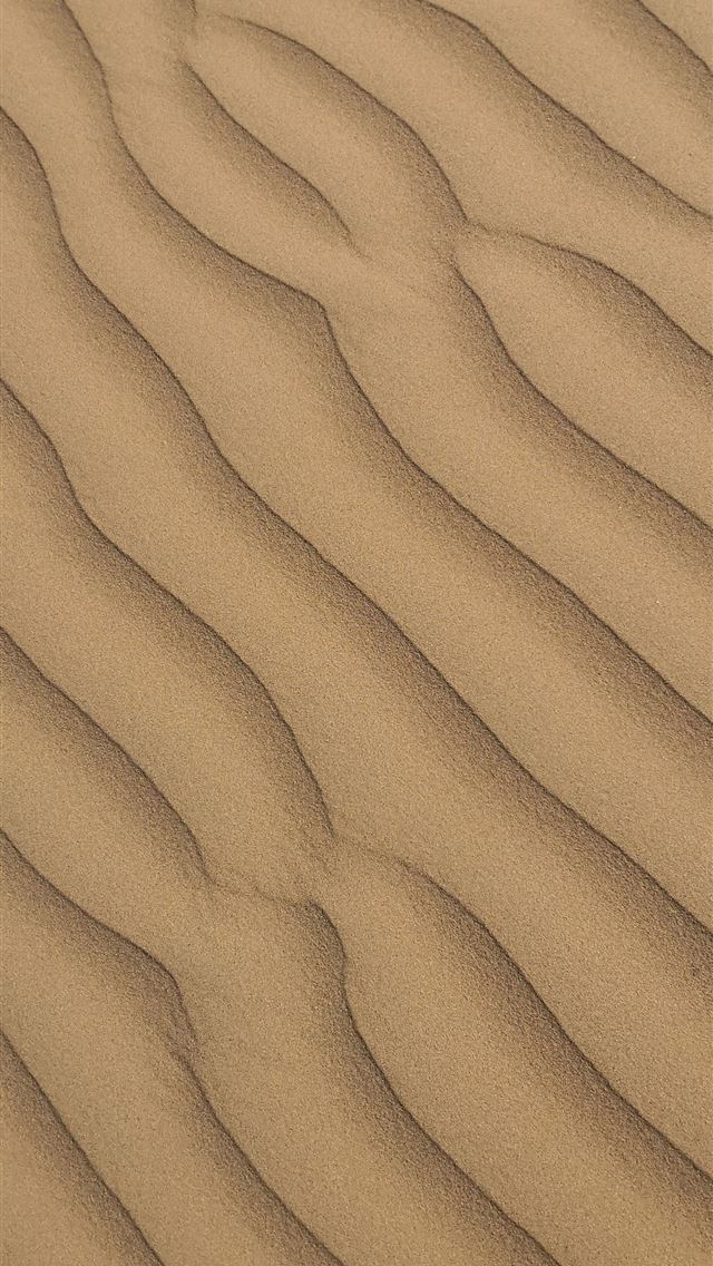 1290x2796 a sand dune with wavy lines in the sand - texture iPhone Wallpaper