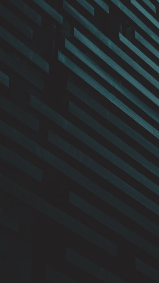 1290x2796 a clock on the side of a building - grey iPhone Wallpaper