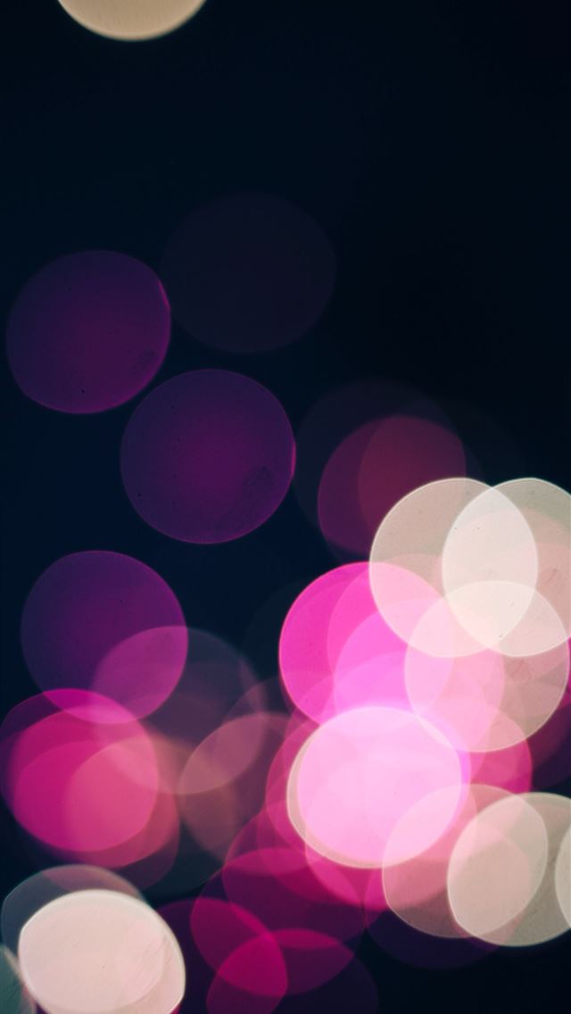 1290x2796 a blurry photo of some lights in the dark - purple iPhone Wallpaper