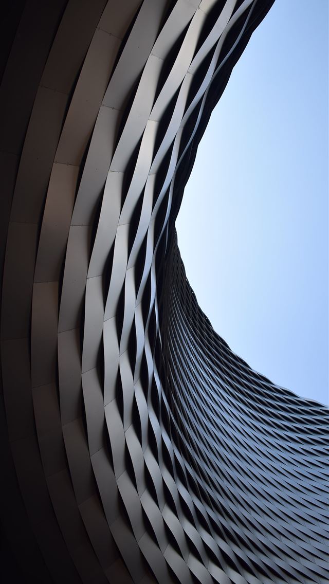 640x1136 a very tall building with a sky in the background -  iPhone Wallpaper