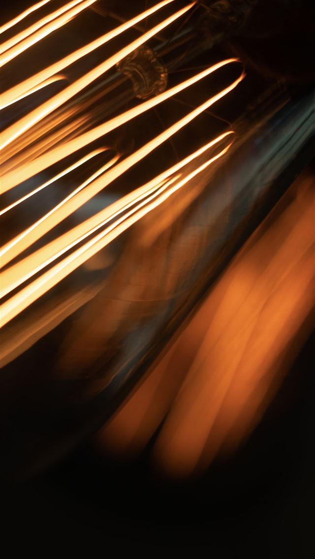 640x1136 a close up of a toaster oven with light coming fro... -  iPhone Wallpaper