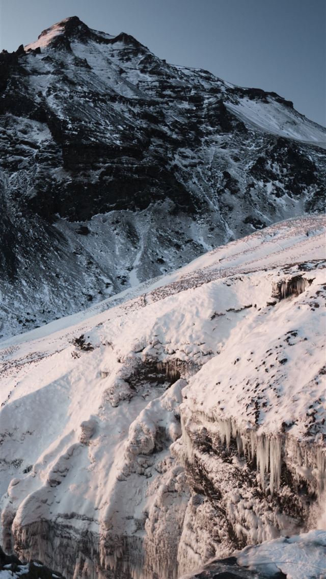 1290x2796 a mountain covered in snow with a sky background - mountain iPhone Wallpaper
