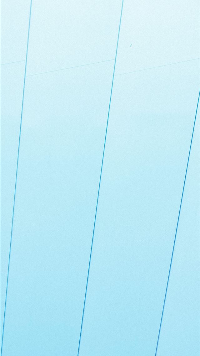 640x1136 a man riding a snowboard on top of a snow covered ... -  iPhone Wallpaper