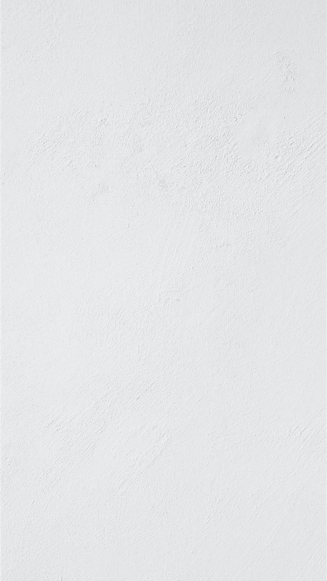 1290x2796 a man riding a snowboard down a snow covered slope - paper iPhone Wallpaper