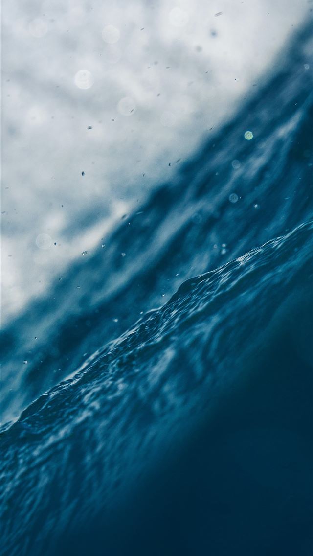 1290x2796 a close up of a wave in the ocean - texture iPhone Wallpaper