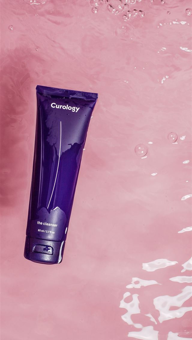 1290x2796 a tube of shampoo floating in a body of water - pink iPhone Wallpaper