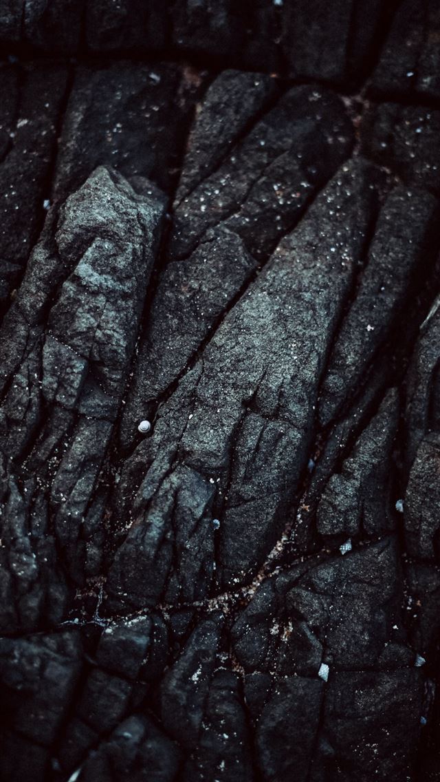 1290x2796 a close up of the texture of a rock - pattern iPhone Wallpaper