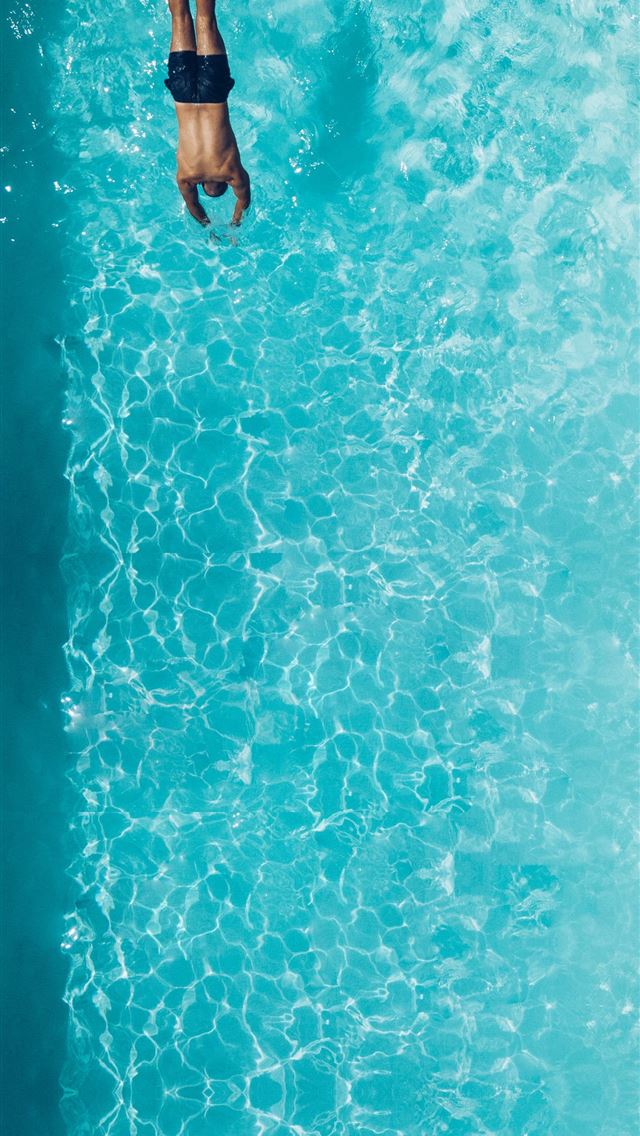 1290x2796 person about to dive on swimming pool - water iPhone Wallpaper