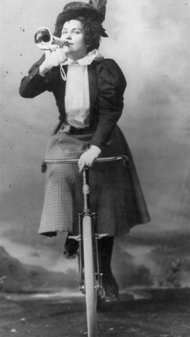 1290x2796 Madge Lessing full length on bicycle holding music... -  iphone 14 Wallpaper