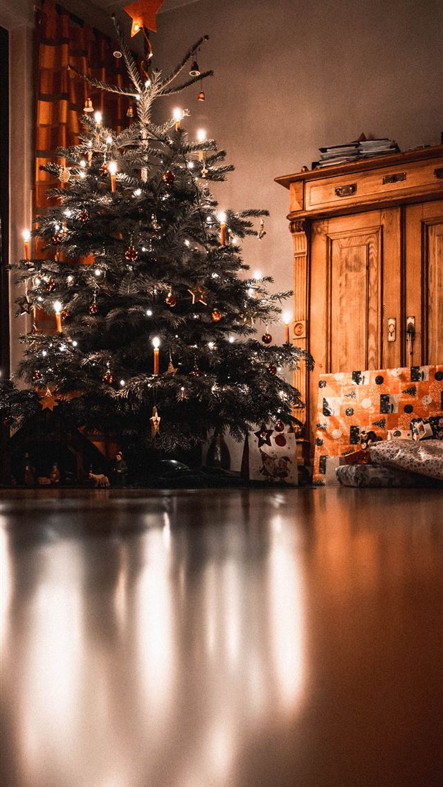 1290x2796 Christmas tree with turned on mini string lights n... - holiday iPhone Wallpaper