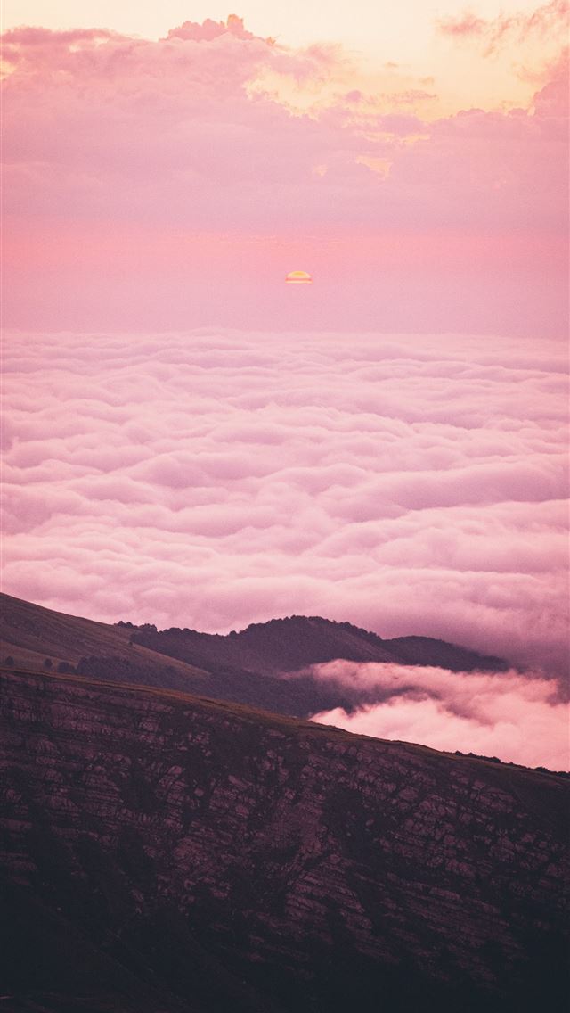 1290x2796 white clouds over mountains during daytime - italy iPhone Wallpaper