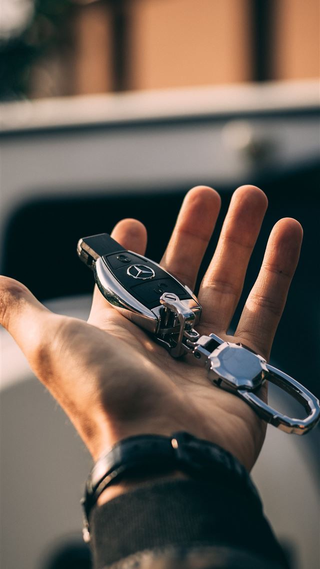 1290x2796 person holding Mercedes Benz fob - summer iPhone Wallpaper