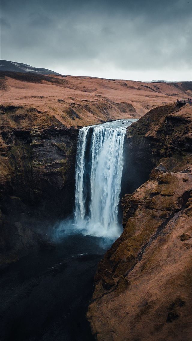 1290x2796 waterfall in the middle of mountains - nature iPhone Wallpaper