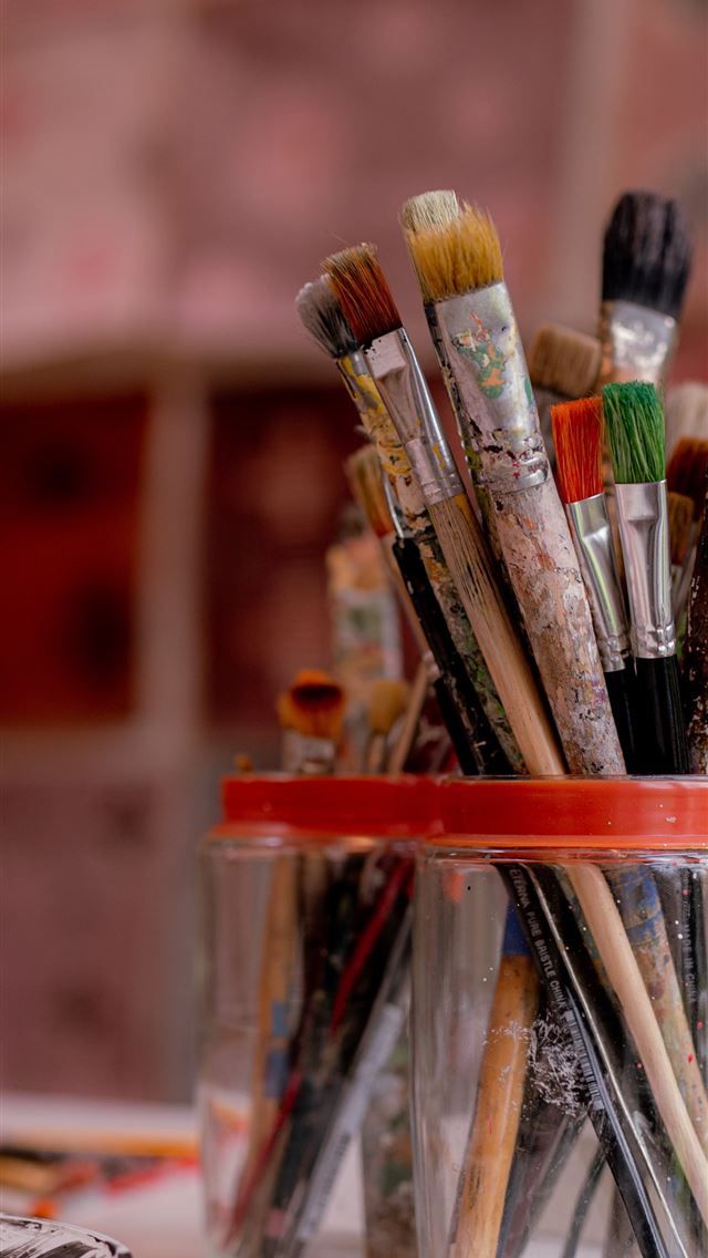 1290x2796 brown and red paint brush in clear glass container - creative iPhone Wallpaper