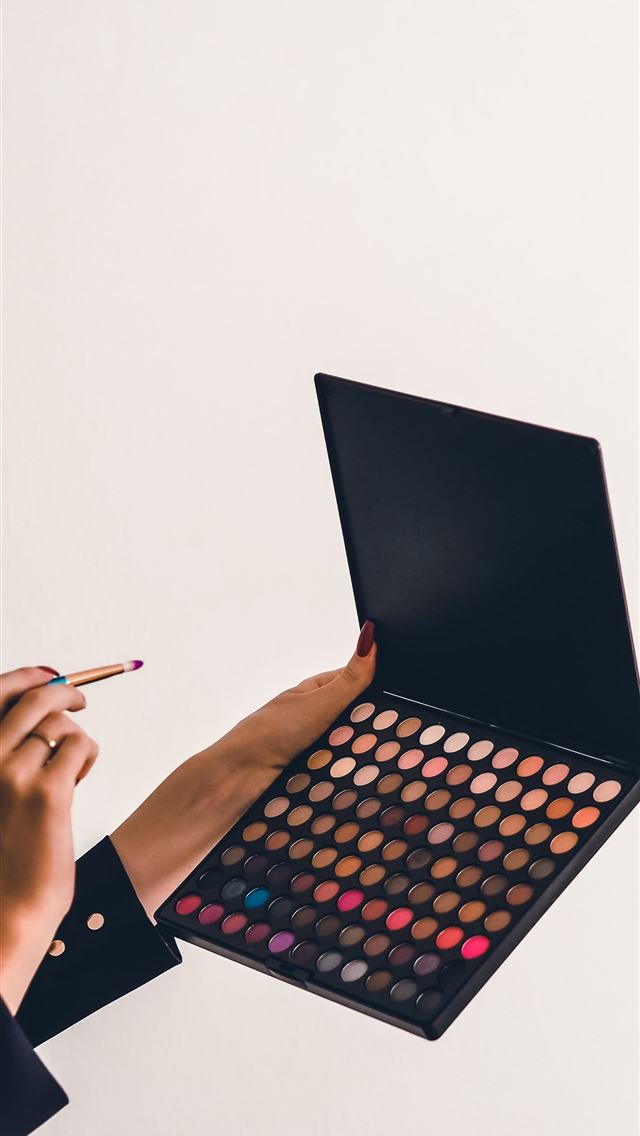 1290x2796 a person holding a makeup palette and a pencil - beauty iPhone Wallpaper