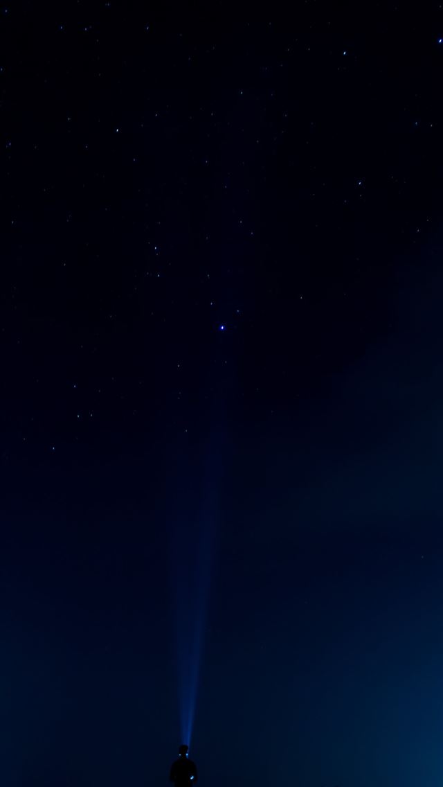 1290x2796 man standing outdoors - night sky iPhone Wallpaper