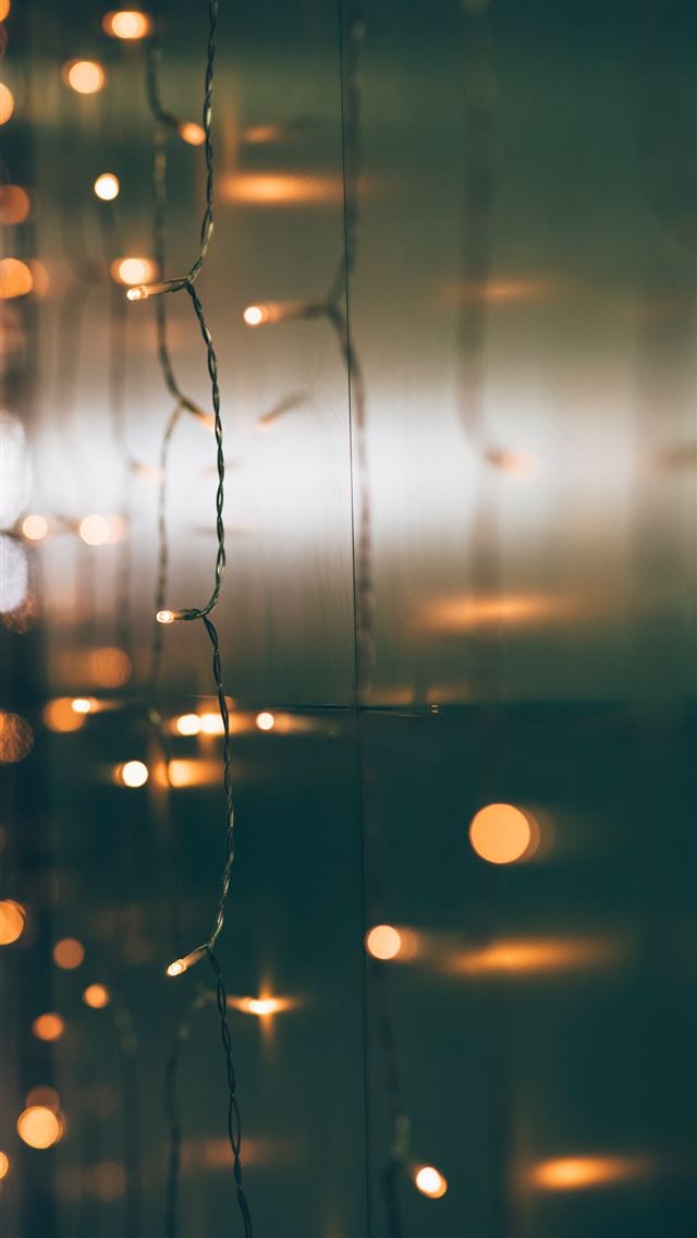 1290x2796 a bunch of lights that are on a wall - winter iPhone Wallpaper