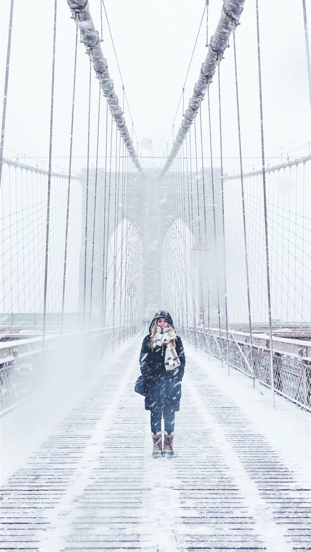 1290x2796 woman wearing black fur lined coat standing on the... - winter iPhone Wallpaper