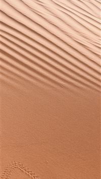 a picture of a heart drawn in the sand wallpaper